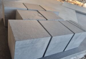 Cubes of black slate for flooring